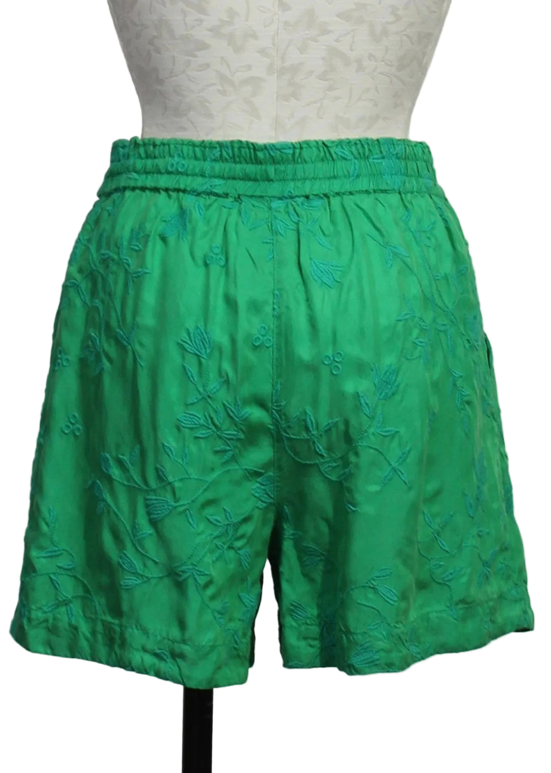 back view of Audrey Eyelet Flower Short by Johnny Was in bright green 