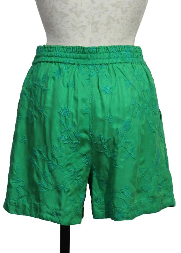 back view of Audrey Eyelet Flower Short by Johnny Was in bright green 