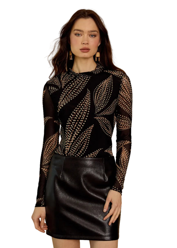 model wearing the Marta Top in Star Dust Leaf by Caballero