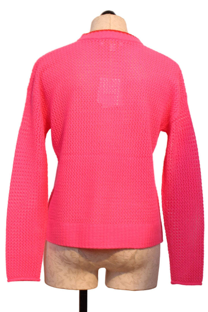 back view of Neon Pink Open for Love Sweater by Lisa Todd