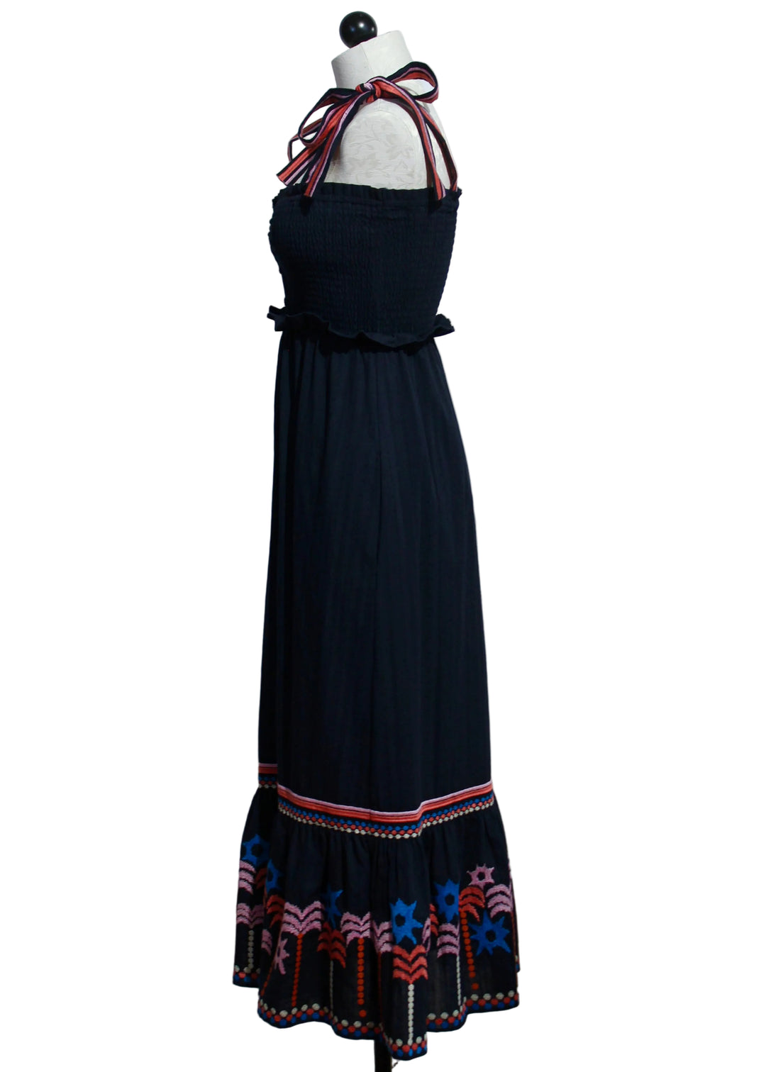 side view of Thandi Dress in the Peacoat Navy Palm Embroidery by Caballero 