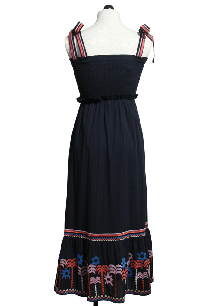 back view of Thandi Dress in the Peacoat Navy Palm Embroidery by Caballero 
