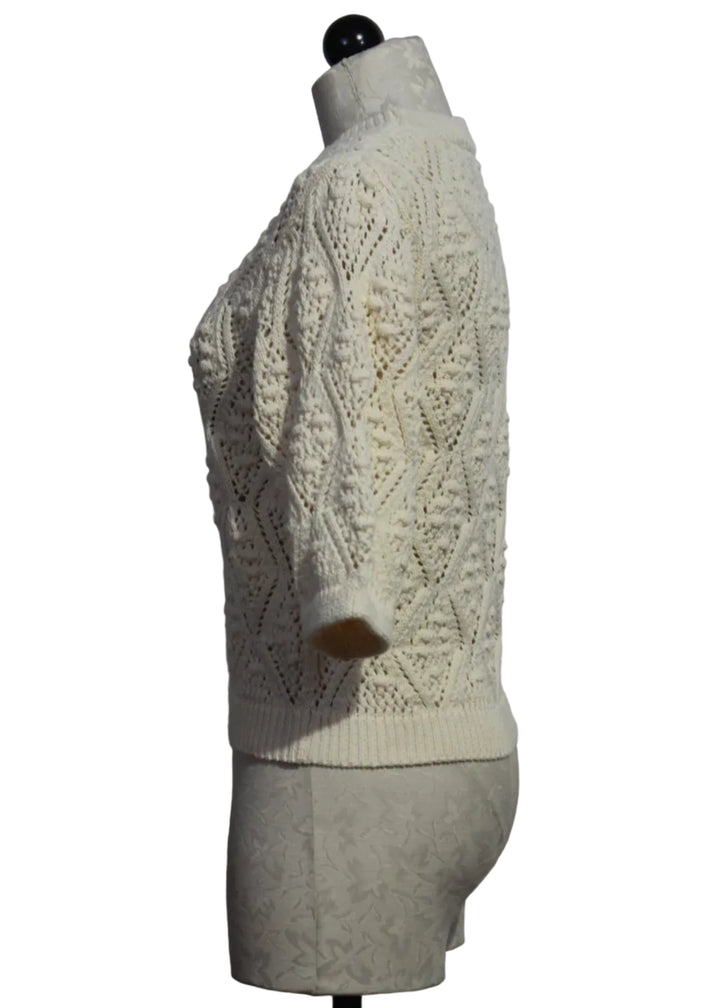 side view of Cream Layla Short Sleeve Sweater by Caballero