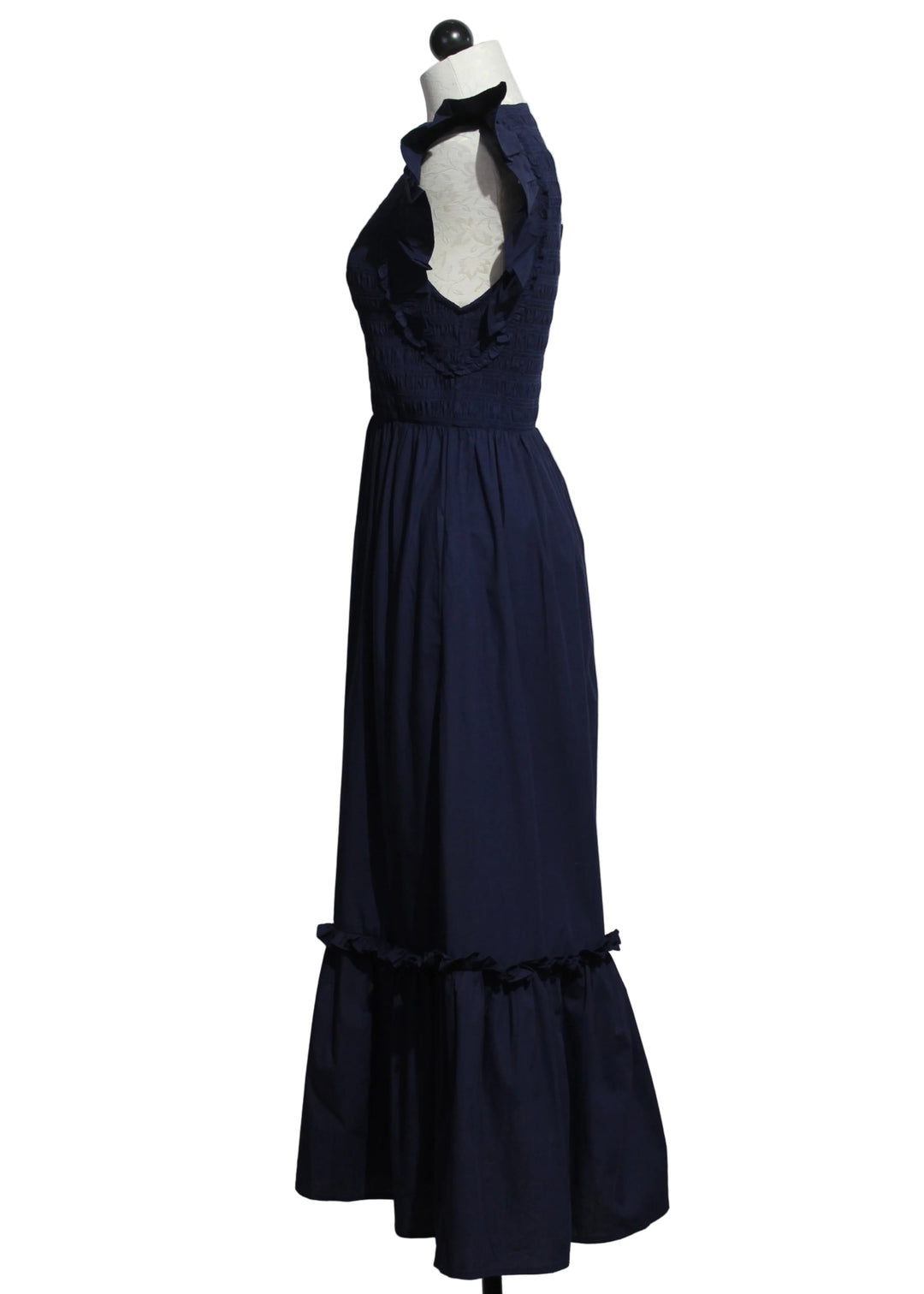 side view of Peacoat Navy colored Gladys Ankle Dress by Cleobella
