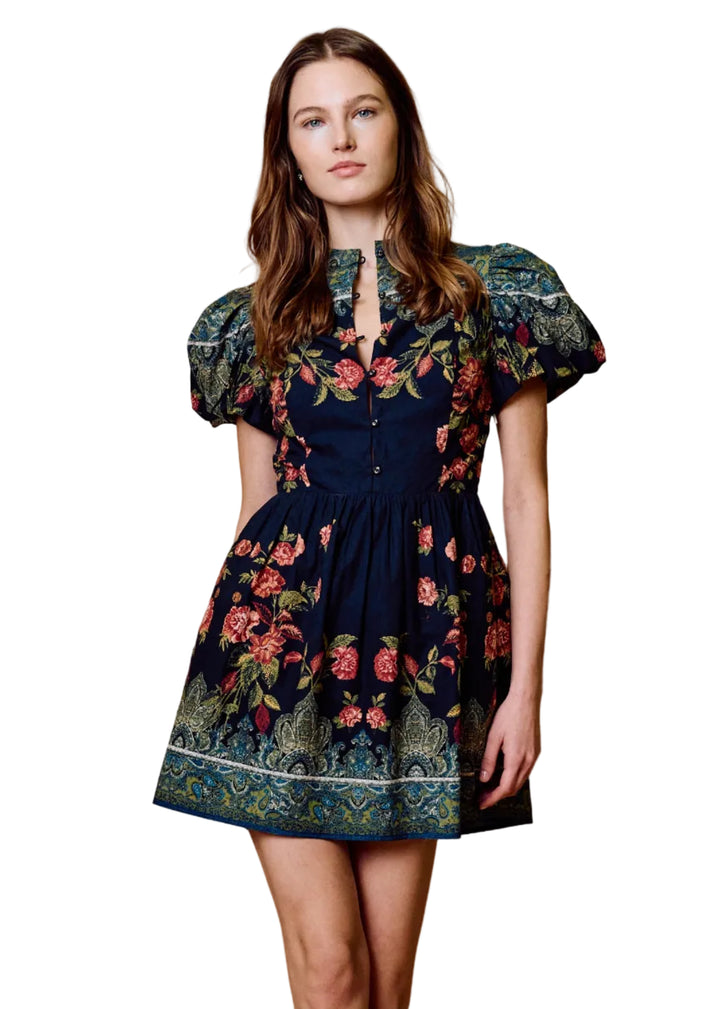 model wearing the Sveti Mini Dress by Cleobella in the EGLANTINE PRINT