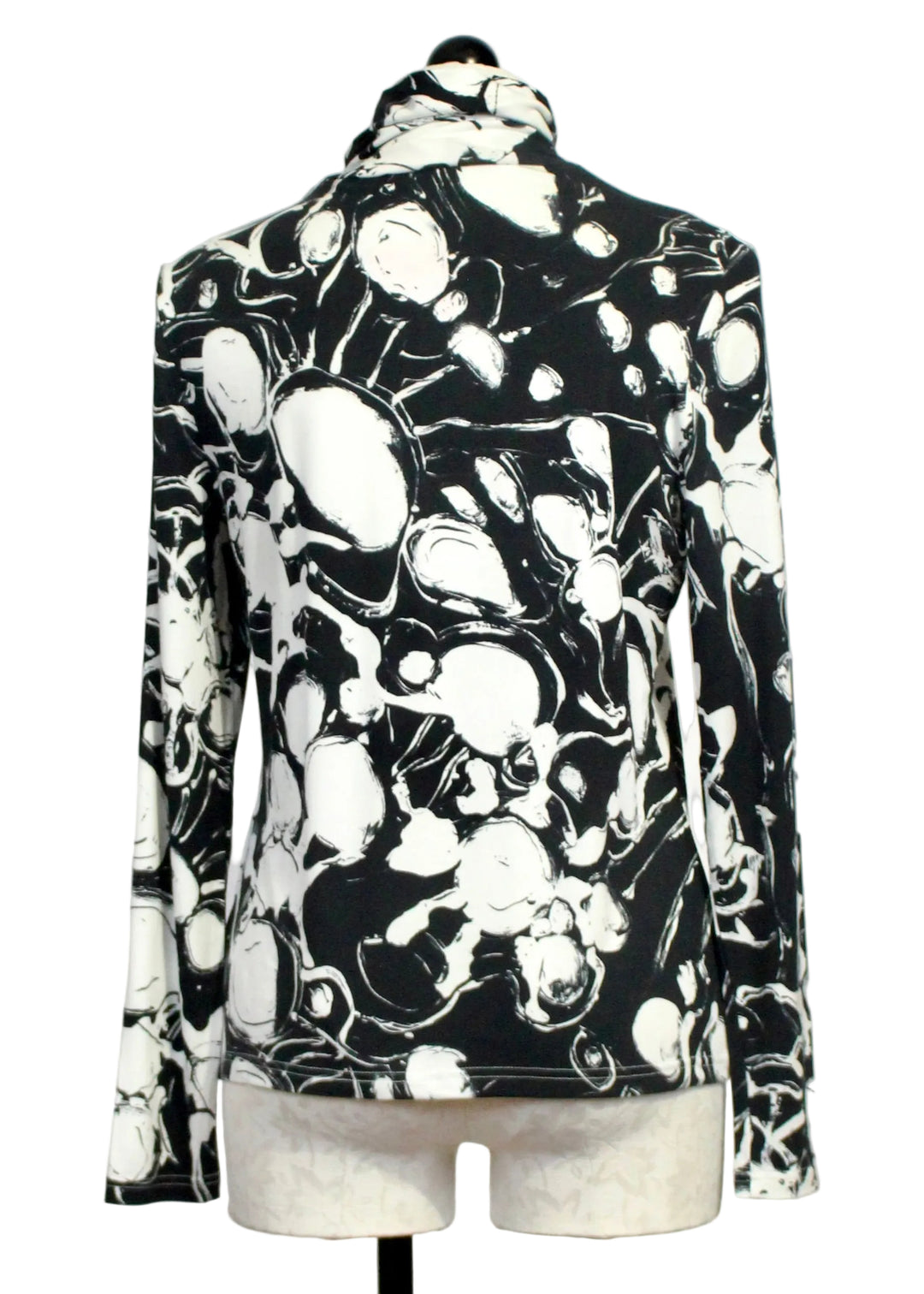 Back view of The Black and White Beach Finds Turtleneck by Claire Desjardins 