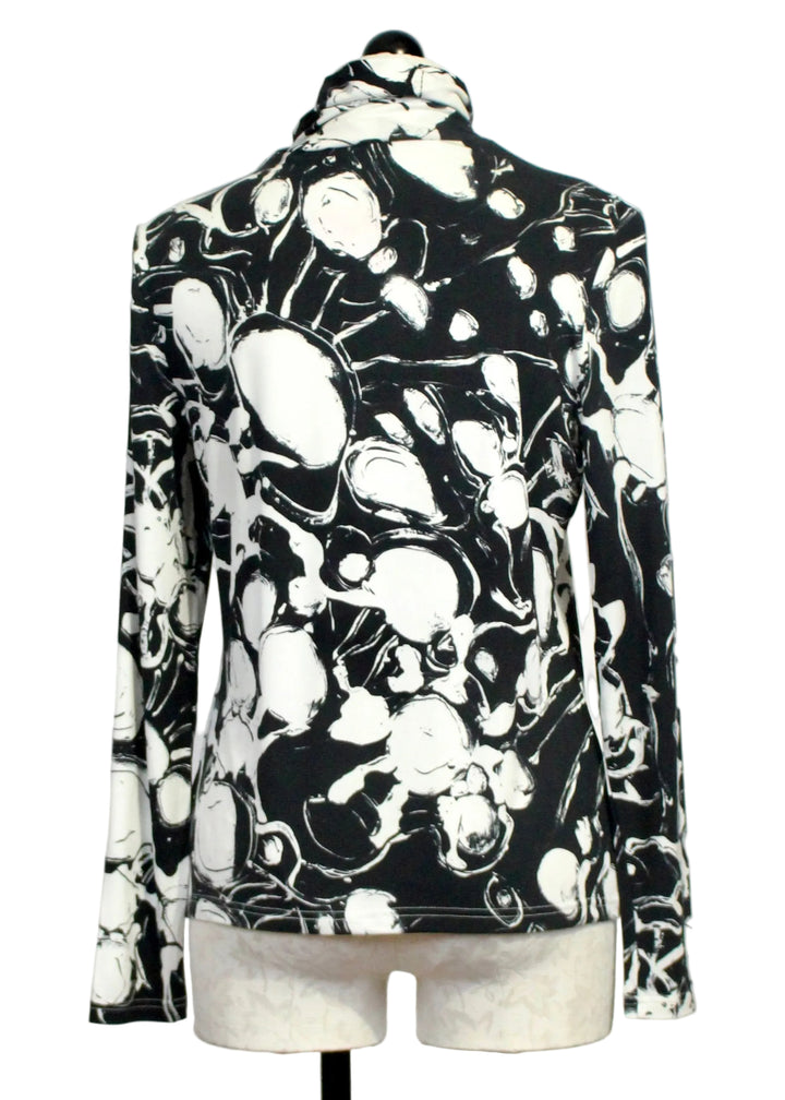 Back view of The Black and White Beach Finds Turtleneck by Claire Desjardins 