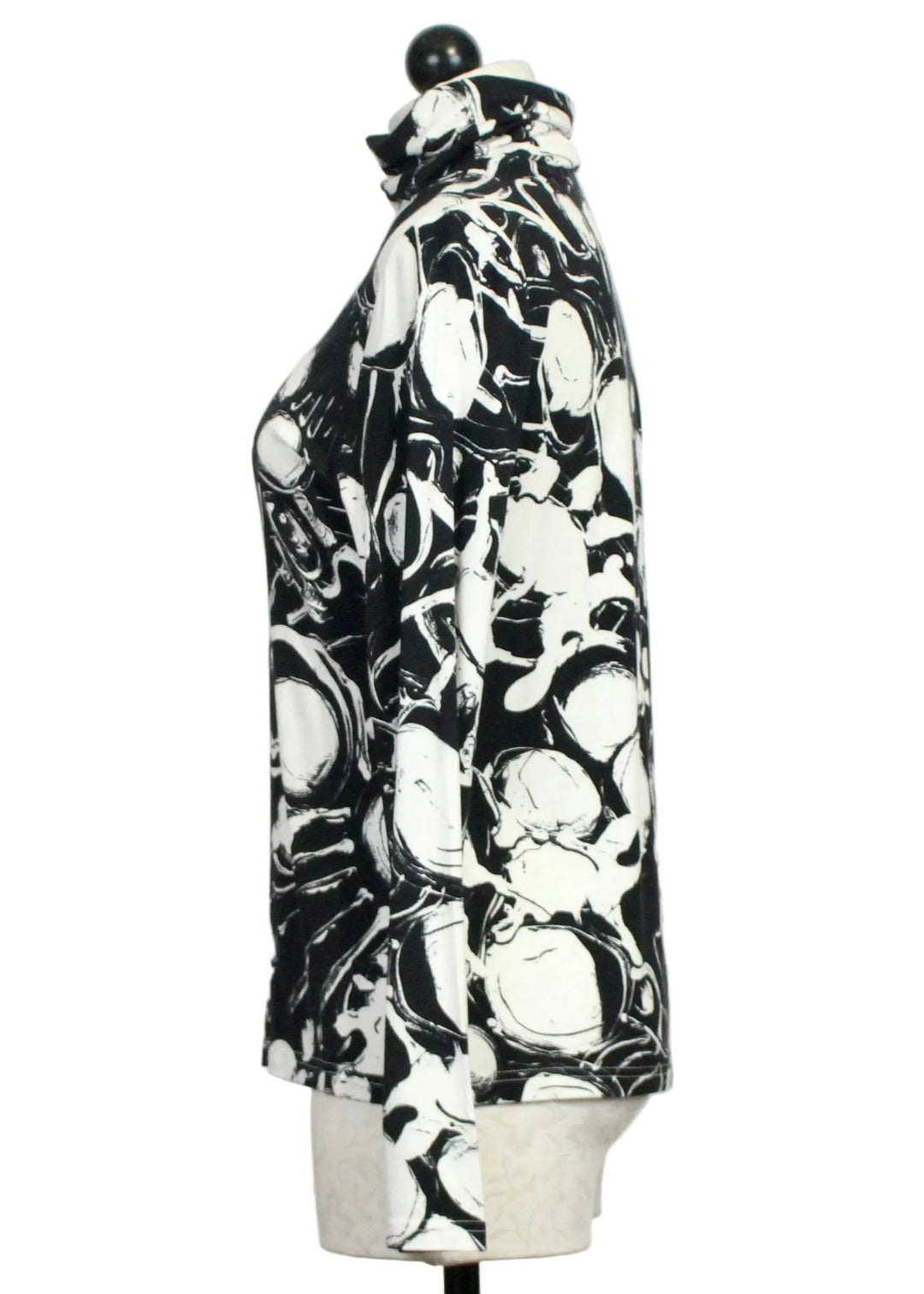 Side view of The Black and White Beach Finds Turtleneck by Claire Desjardins 