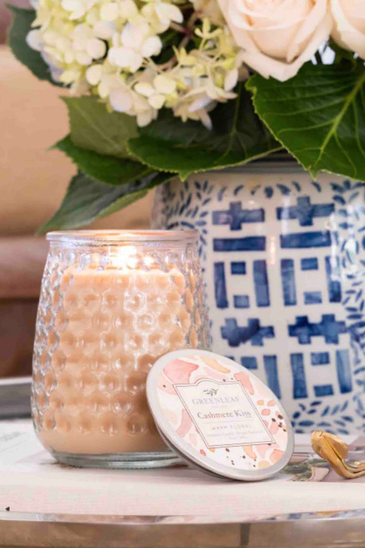 Cashmere Kiss Signature Candle by Greenleaf Gifts in a home setting 