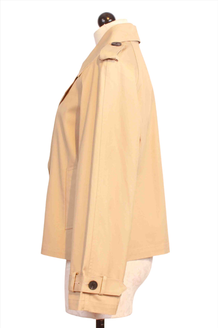 side view of Khaki colored Chelsea Cropped Trench Jacket by Fifteen Twenty