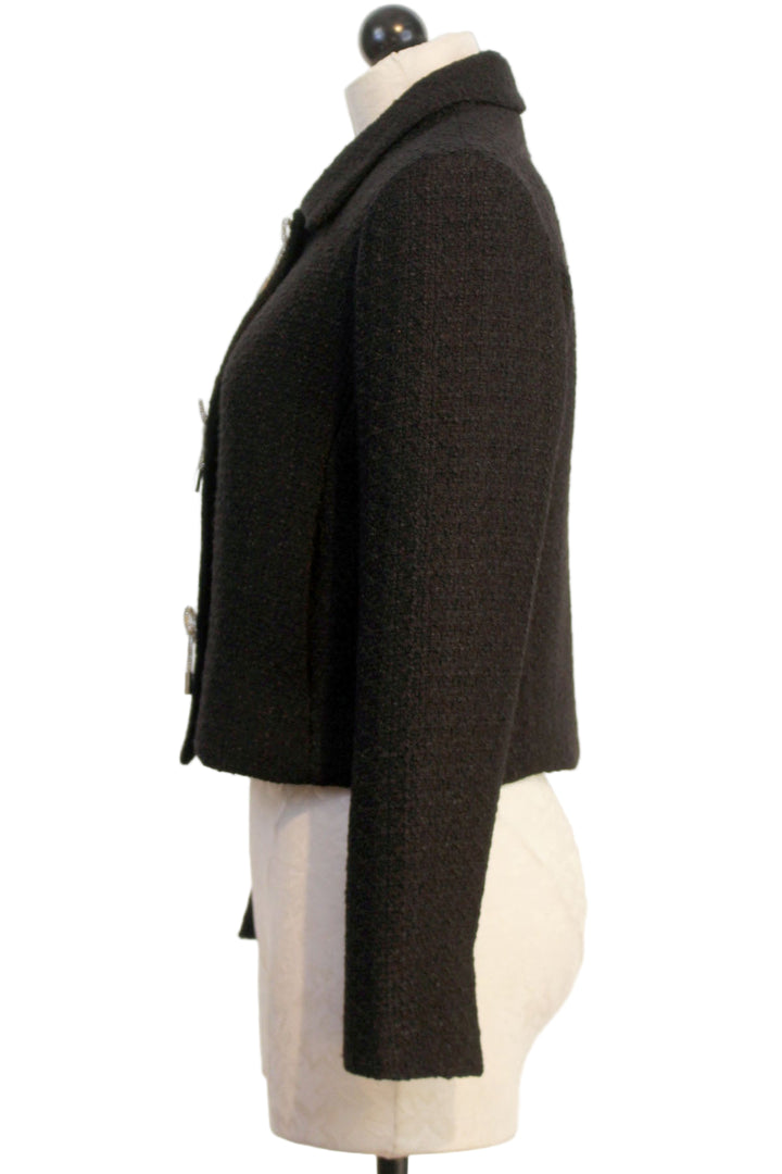 side view of Black Chris Tweed Jacket by Drew with Three Crystal Bows over snap buttons