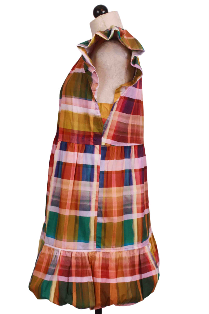 side view of Colorful Madras Print Clover Dress by Marie Oliver with a bottom bubble ruffle