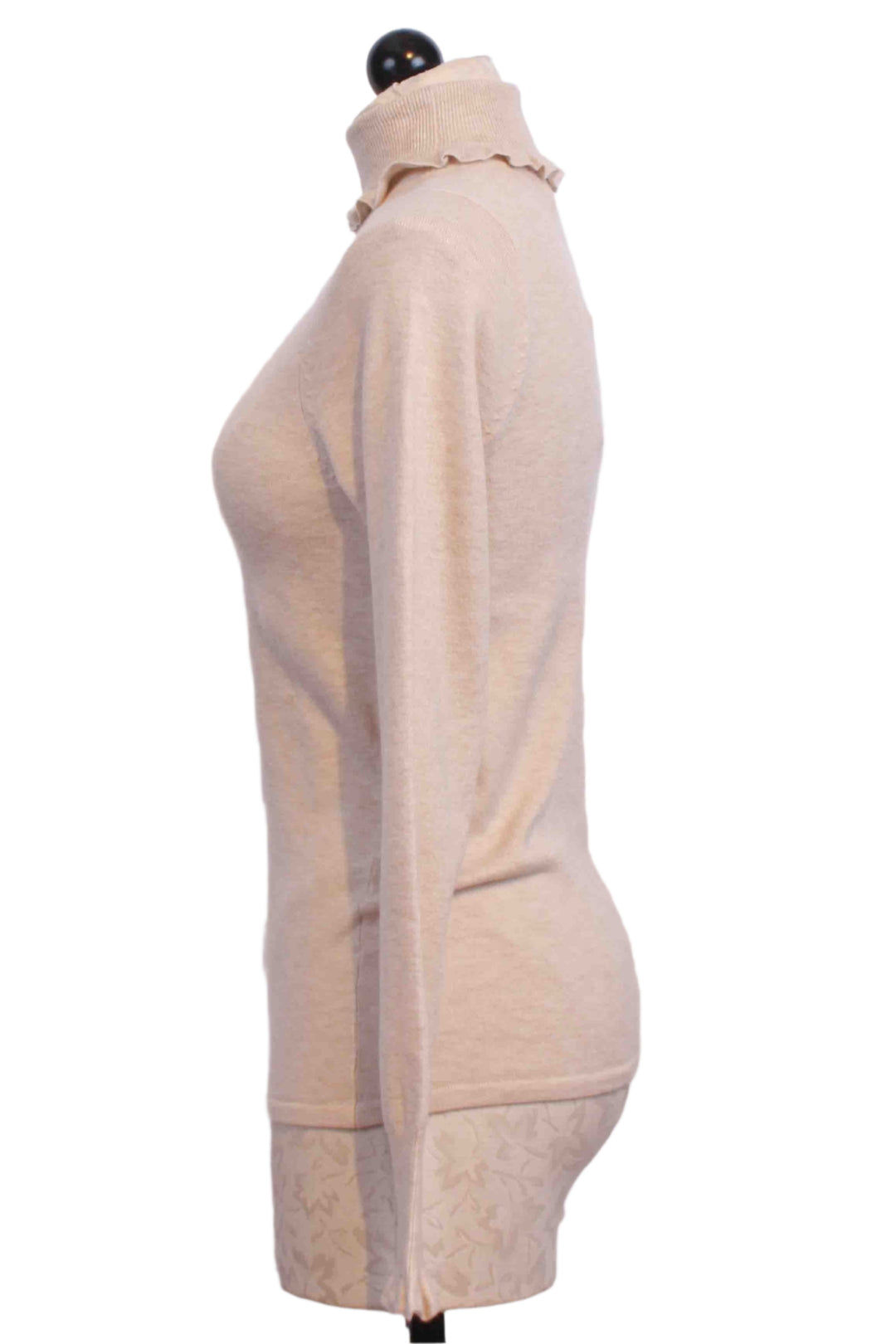 side view of Cream Corgan Turtleneck by Marie Oliver