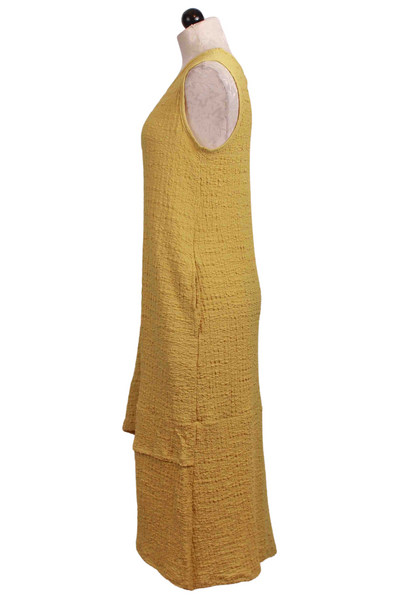 side view of Long Lime colored Sleeveless Asymmetrical Hem Waffle Fabric Dress by Inoah