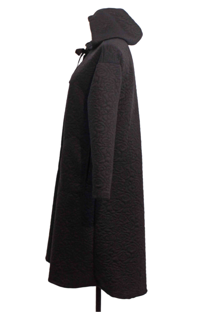 side view of Hooded Quilted Black Dress by Inoah with Pockets