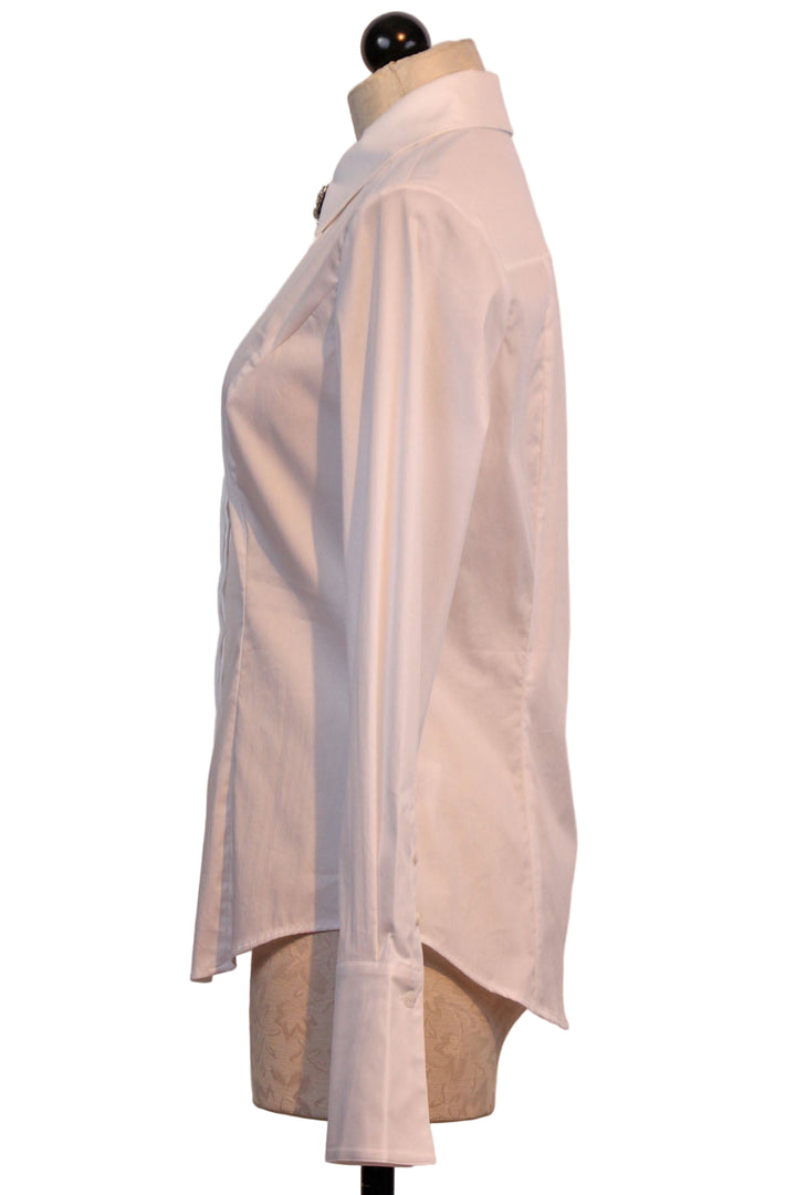 side view of The Darling Top in White by Favorite Daughter with a beautiful crystal Brooch Clip
