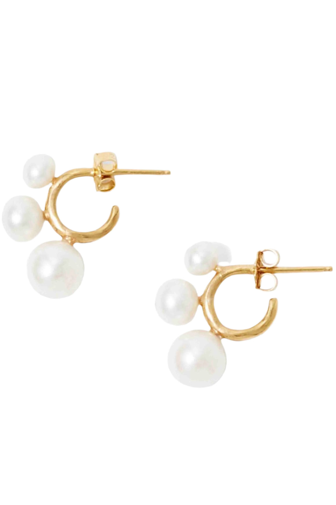 Three Graduated Sizes of Freshwater pearls on 18K gold plated sterling silver post back hoops by Chan Luu.