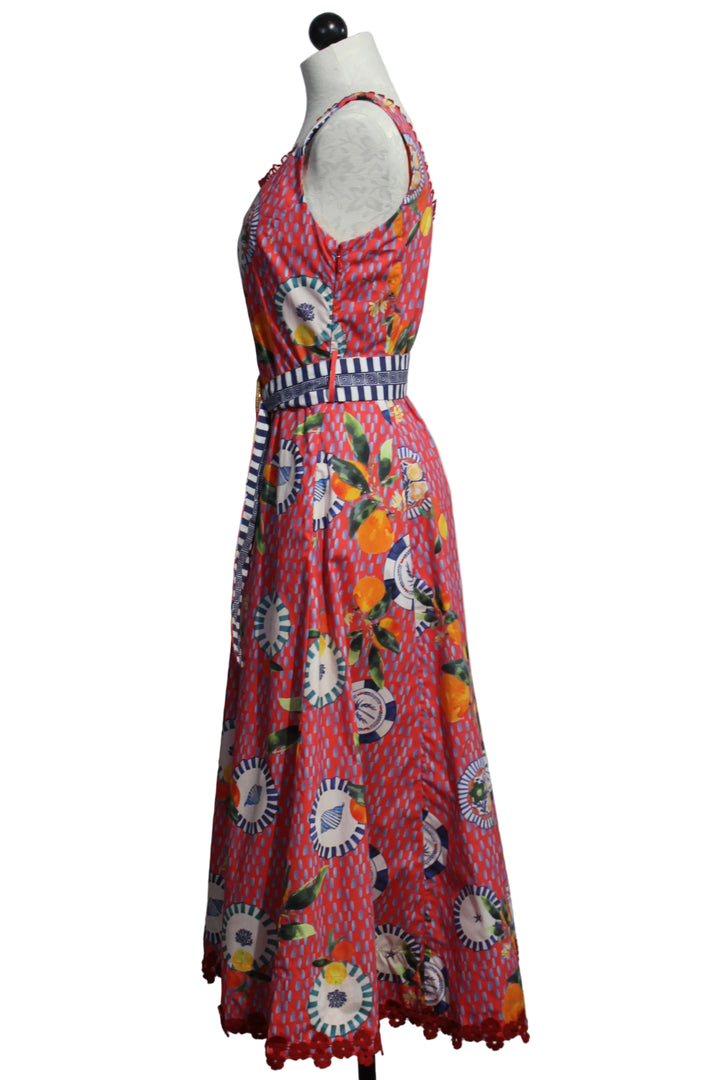 side view of Aubrey Dress by Emily Lovelock in a Lava Red Print