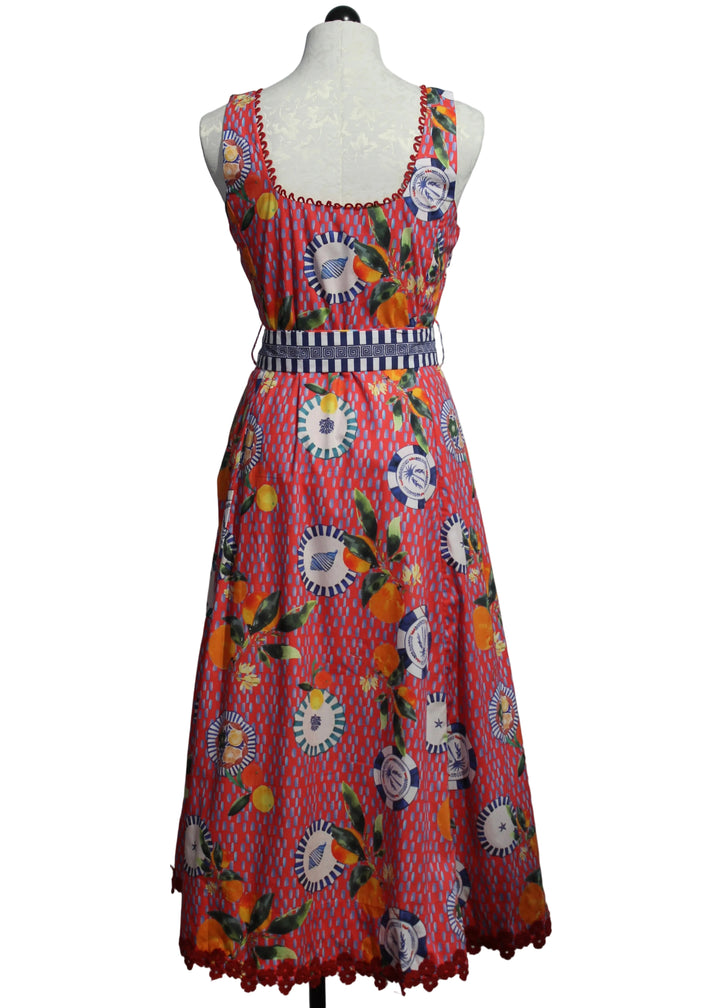 back view of Aubrey Dress by Emily Lovelock in a Lava Red Print
