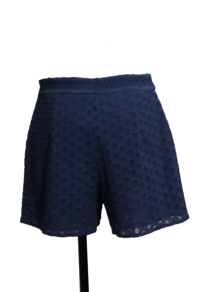 back view of The Deep Cobalt Eyelet Nova Shorts by Emily Lovelock