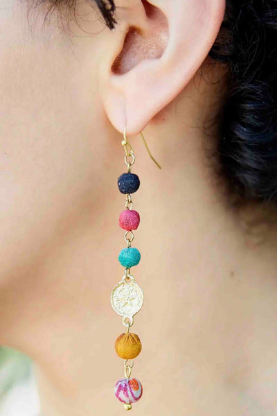 model wearing the Multicolored Kantha Raindrop Earrings by World Finds