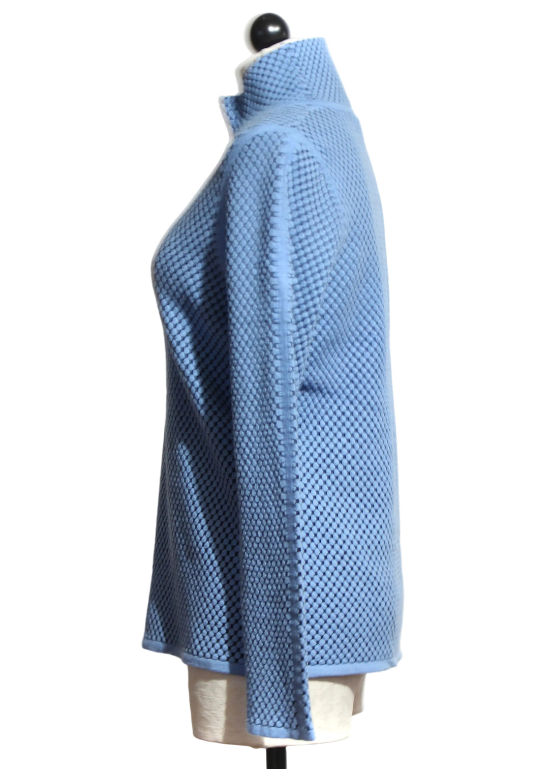 Side view of The Blue/Black Round Mosaic Dot Turtleneck by Elena Wang 