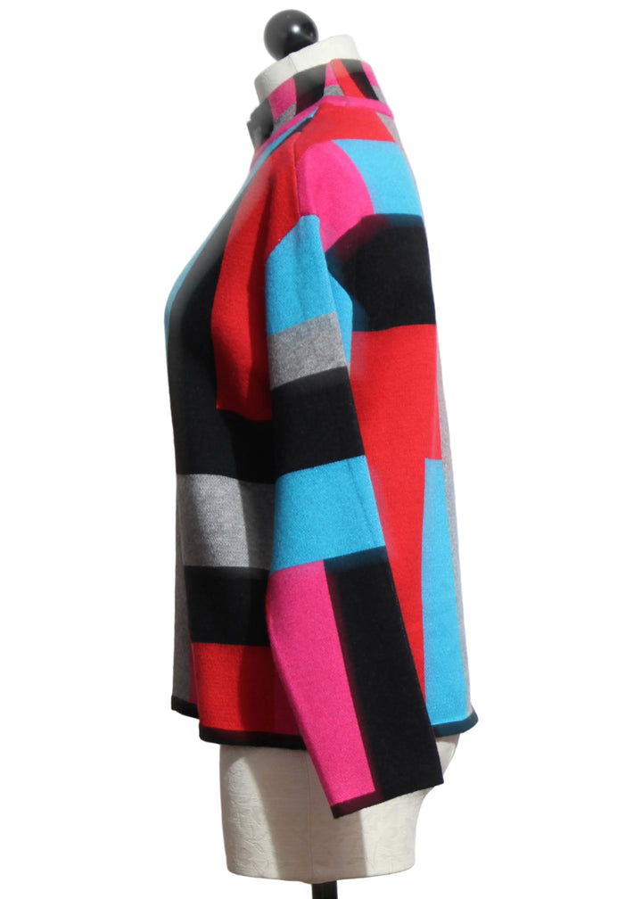 Side view of The Geometric Mock Neck Sweater by Elena Wang 