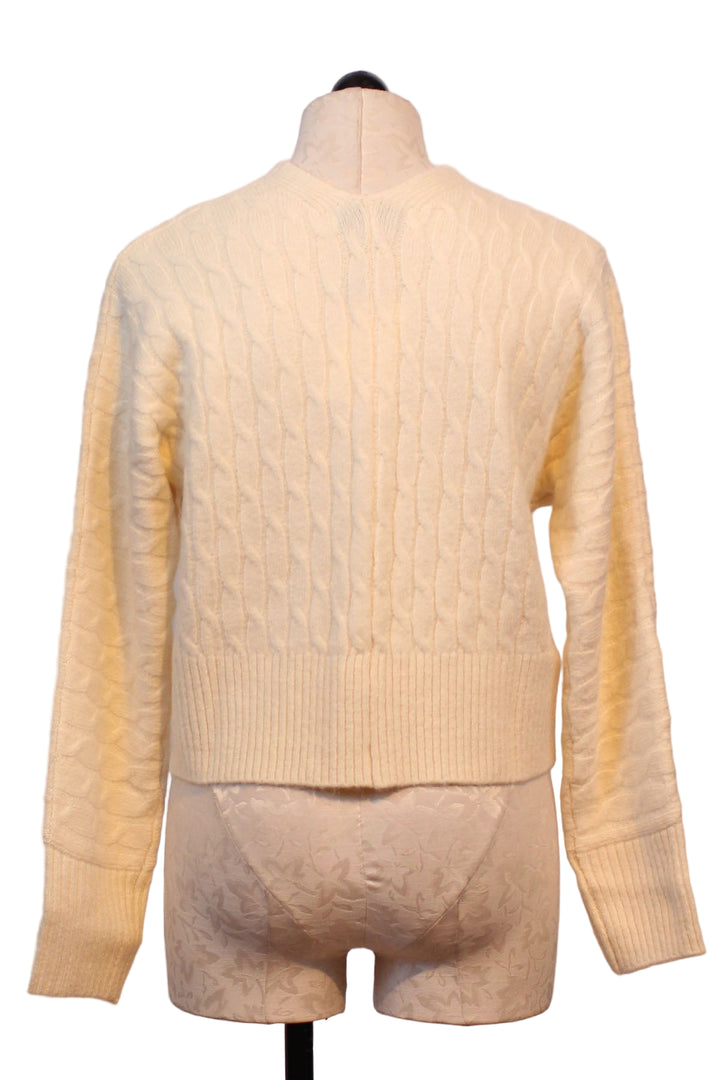 back view of Alabaster colored Emile Cardigan by John and Jenn with chain closures