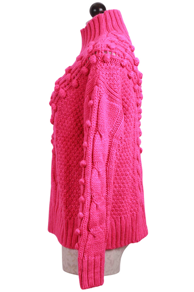 side view of Electric Pink Eris Mock Neck Sweater by Marie Olive