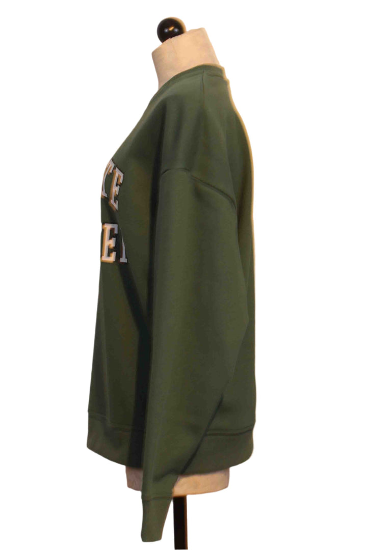 side view of  Evergreen Collegiate Sweatshirt by Favorite Daughter 