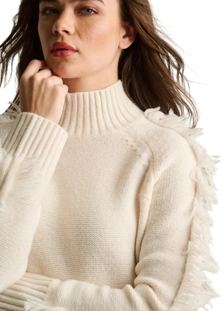 model wearing the WINTER WHITE Fringe Benefits Sweater by Lisa Todd