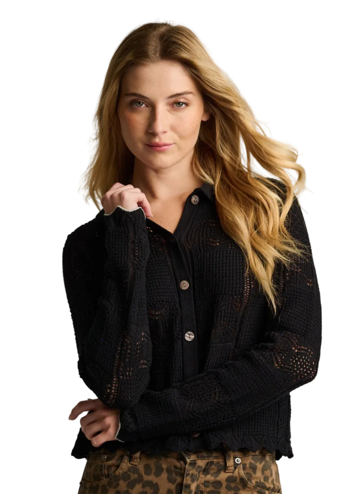 model wearing the Black Checkmate Cardigan by Lisa Todd
