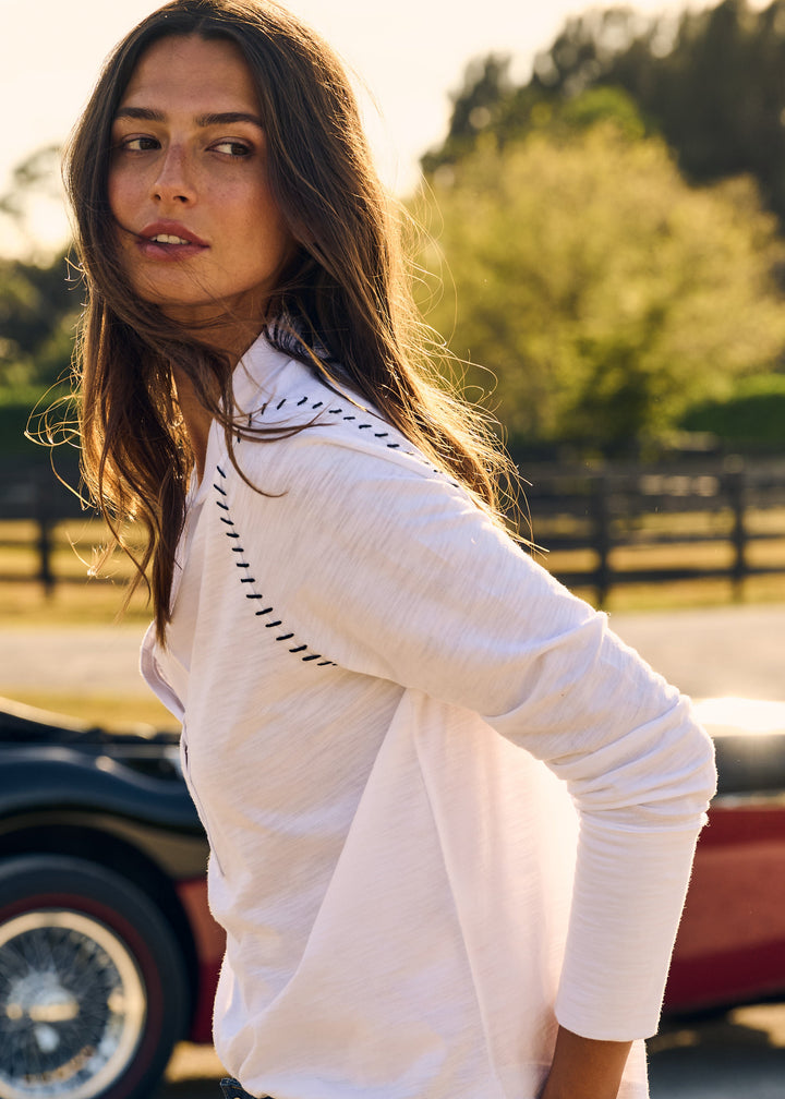 model wearing the White Long-Sleeve Whipstitching Collared Top by Lisa Todd