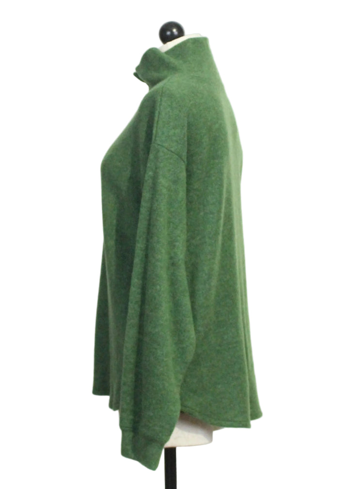 Side view of The Brushed Buttoned Down Top by Nally and Millie in Hunter Green