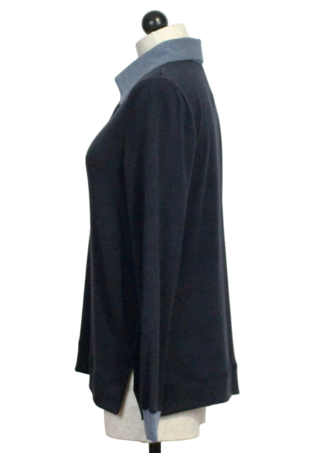 Side view of The Long Sleeve Buttoned Collar Top by Nally and Millie in Midnight