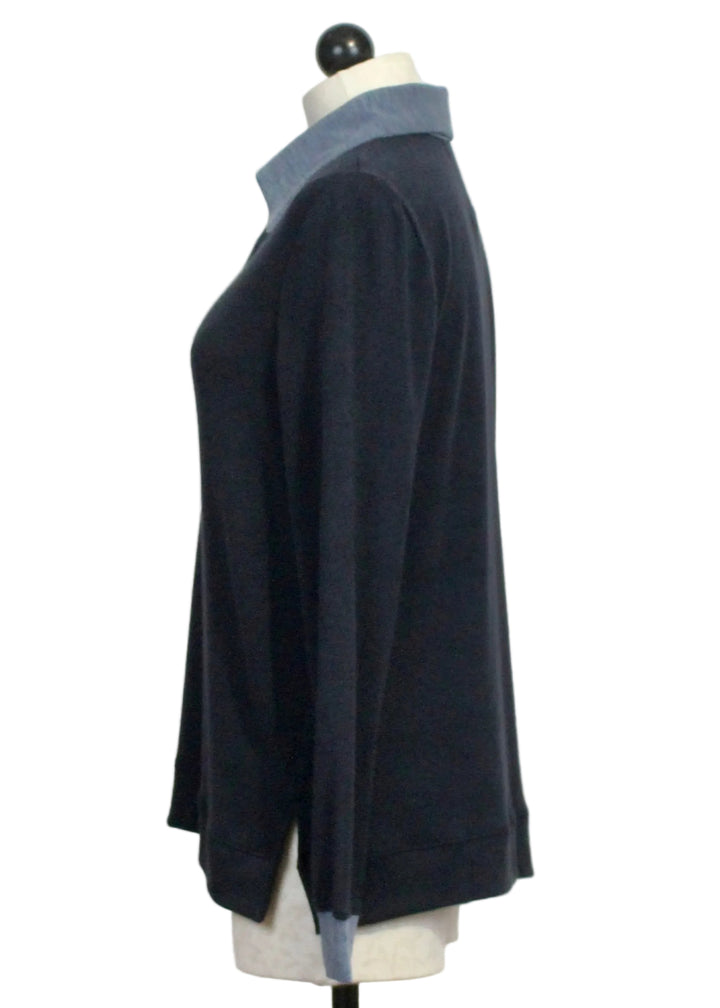Side view of The Long Sleeve Buttoned Collar Top by Nally and Millie in Midnight