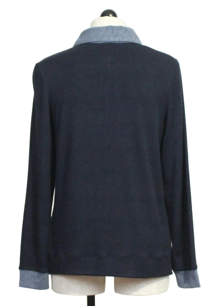 Back view of The Long Sleeve Buttoned Collar Top by Nally and Millie in Midnight
