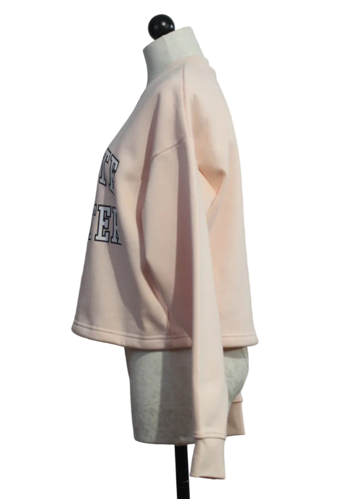 side view of Pale Pink Cropped Collegiate Sweater by Favorite Daughter