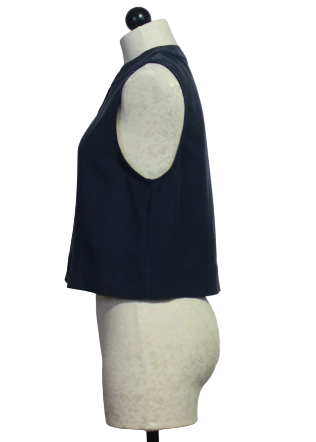 Side view of The Sleeveless Navy Fine Line Top by Favorite Daughter 