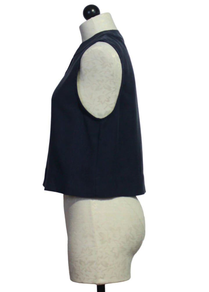 Side view of The Sleeveless Navy Fine Line Top by Favorite Daughter 