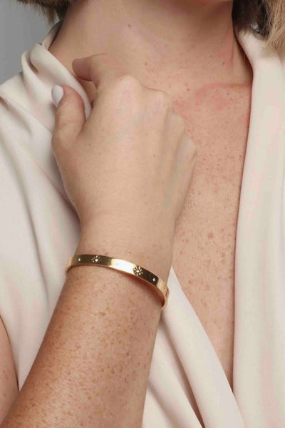 14K Gold Plated Orion Cuff Bracelet by Marrin Costello worn on a model