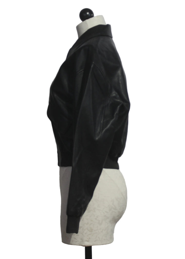 side view of The Better Than Leather Bomber Jacket by Good American in Black001