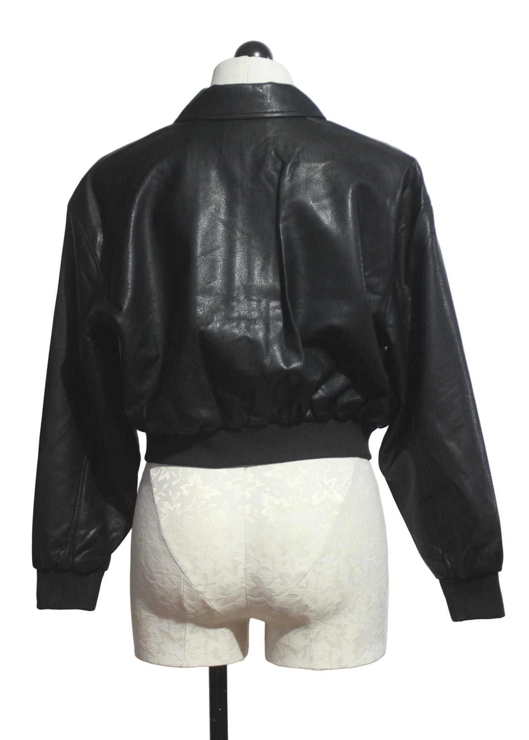 back view of The Better Than Leather Bomber Jacket by Good American in Black001