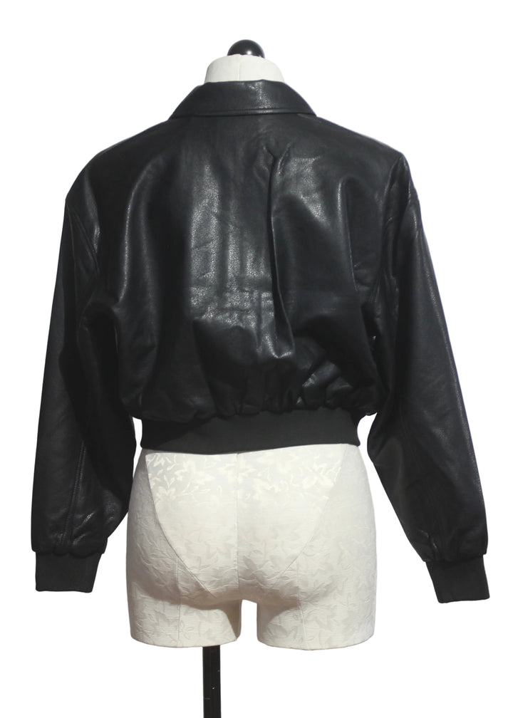 back view of The Better Than Leather Bomber Jacket by Good American in Black001