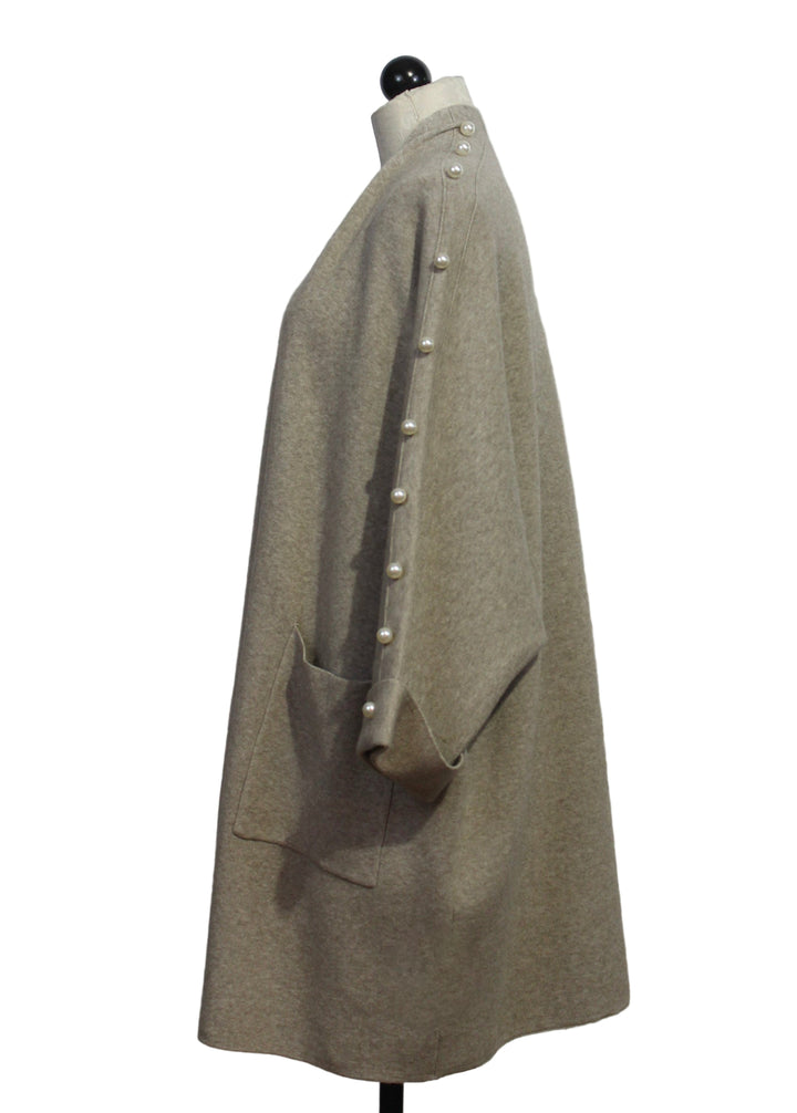 side view of Beige Long Open Front Cardigan with pearls down the sleeves by Nikky