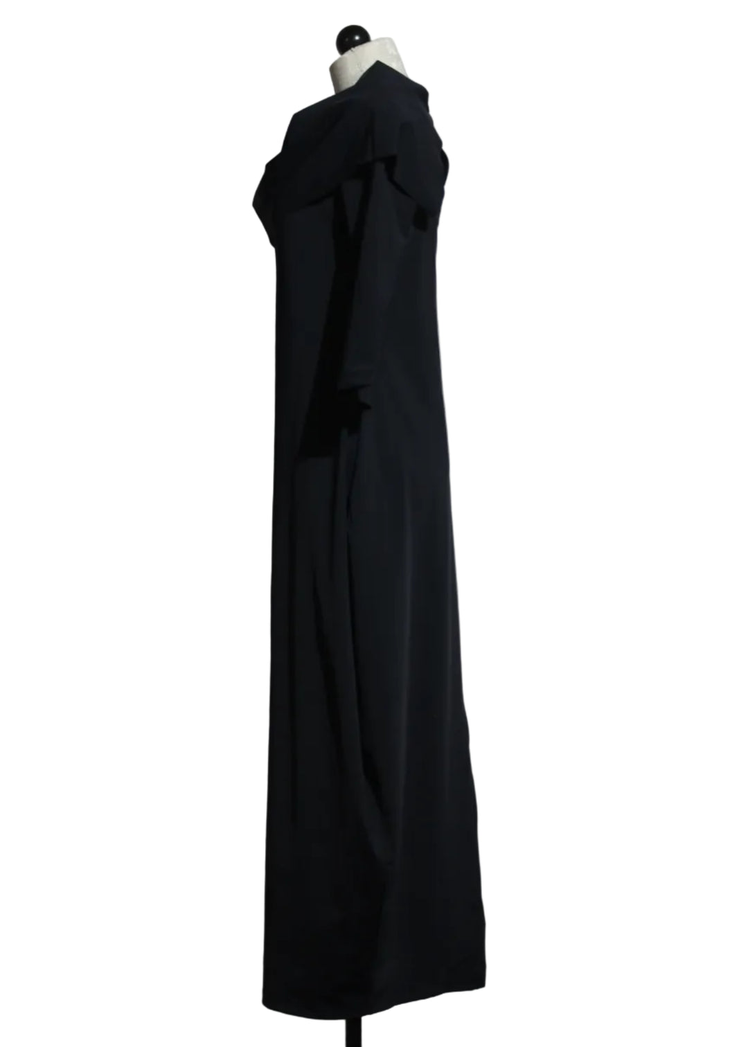 side view of Coal Black Jura Dress by Kozan with a rollover neck, flared sides and 3/4 length sleeves