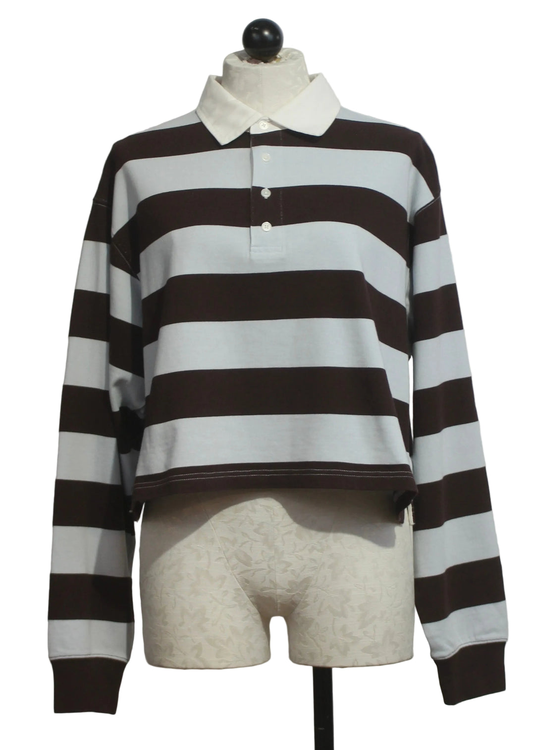 The Cropped Rugby Polo by Good American in the Expresso Skyblock 