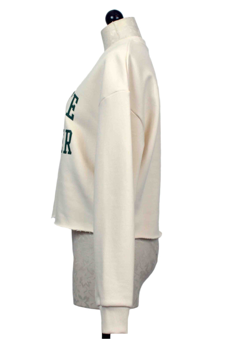 side view of Gardenia with Emerald Cropped Collegiate Sweatshirt by Favorite Daughter