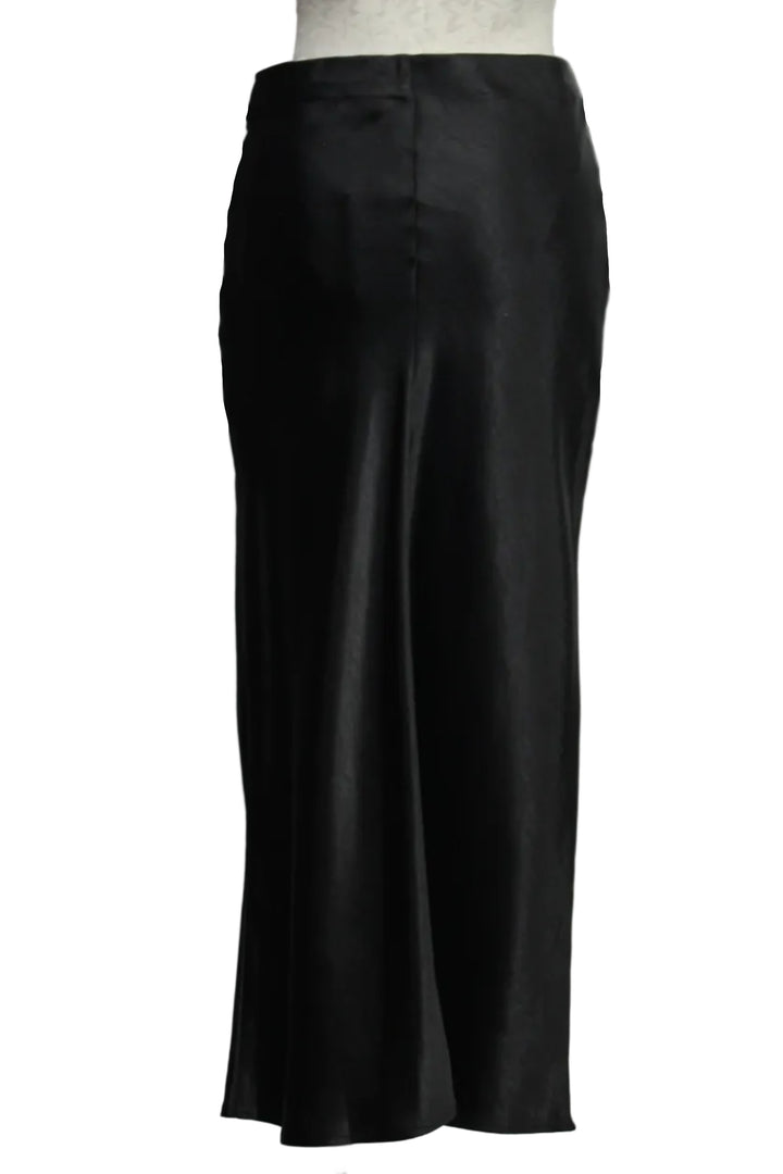 back view of the black Ari Midi Skirt by Melissa Nepton