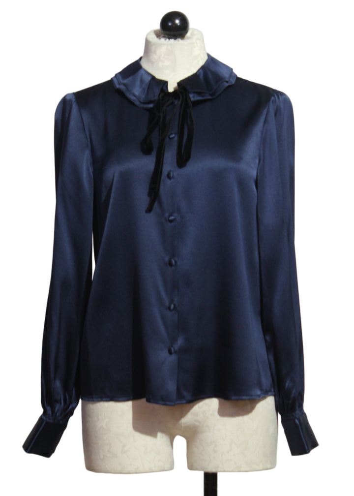 Midnight Blue Emerson Blouse by Cartolina with a Ruffle Collar and a Black Velvet Tie at the neck